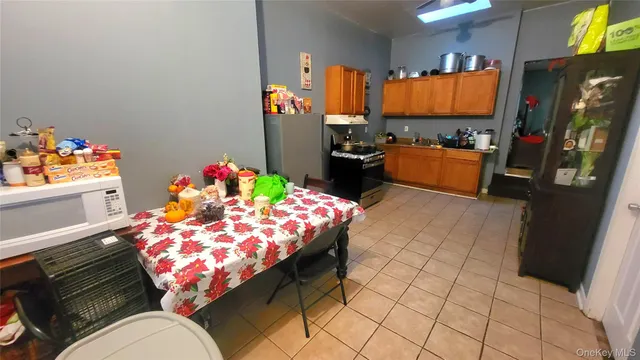 a room with furniture toys and a flat screen tv