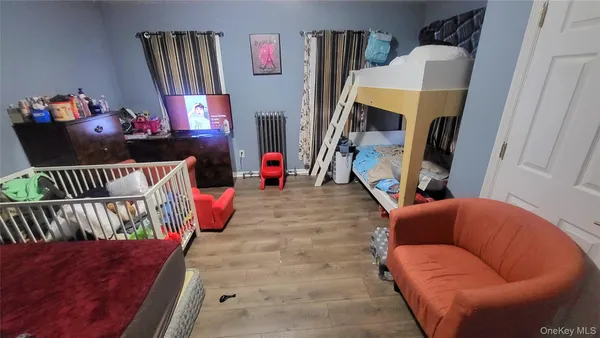 a living room with furniture fireplace and a flat screen tv