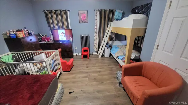 a living room with furniture fireplace and a flat screen tv