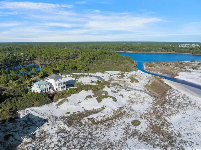 an aerial view of residential building with ocean view