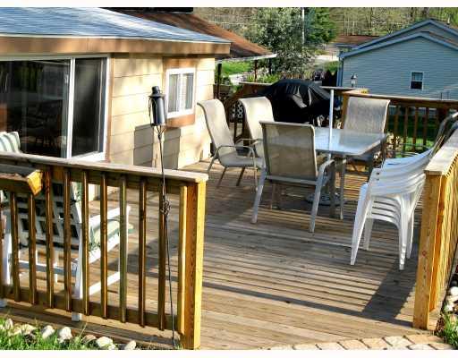 4317 Partell Street Butler, PA 16001 - Photo 10 of 11 Exterior Back. Enjoy entertaining your guests on this comfortable back deck.
