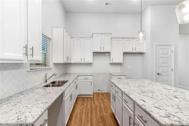 a view of a sink and dishwasher