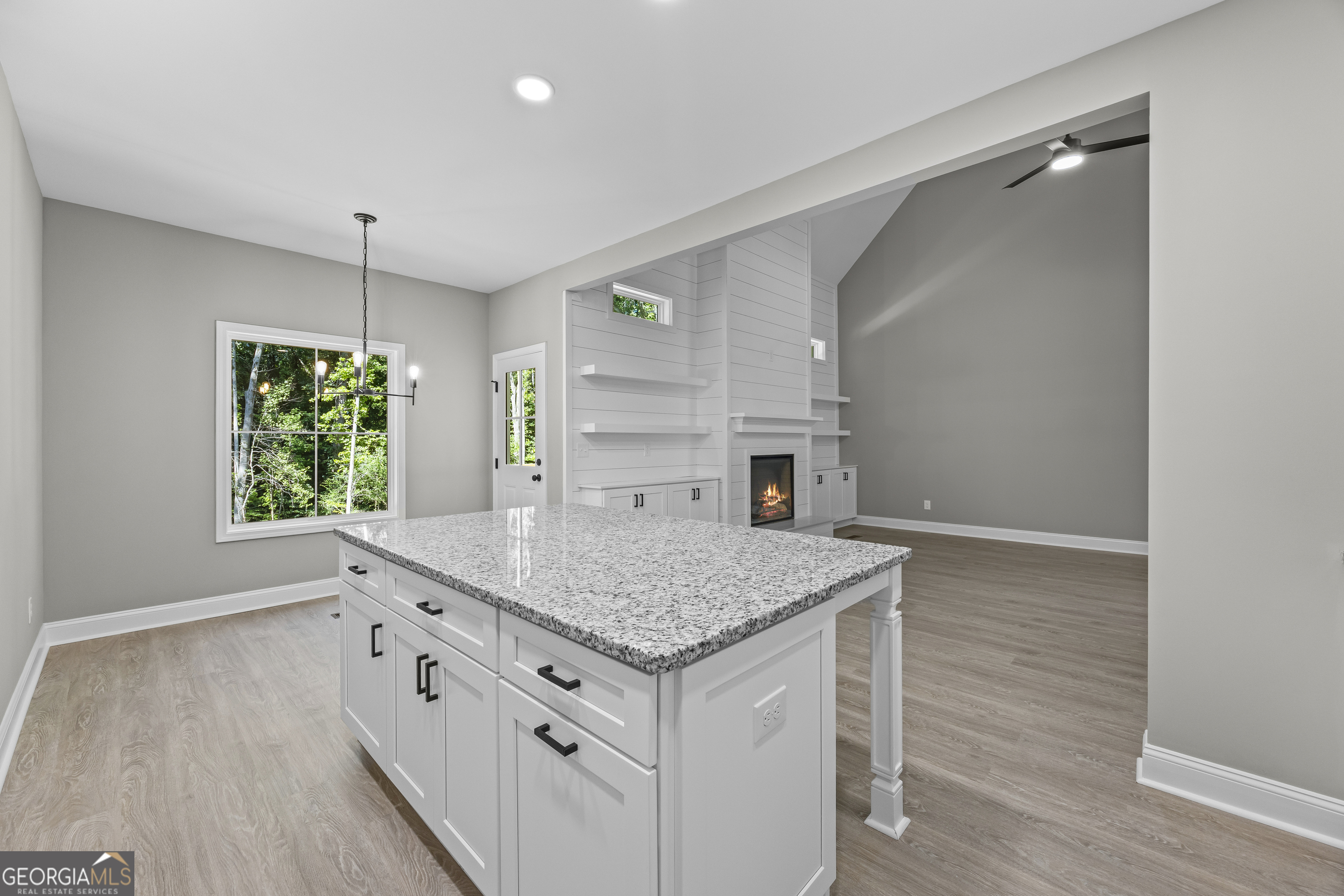 119 Gordon Road Commerce, GA 30530 - Photo 11 of 40 a kitchen with a sink stove and refrigerator