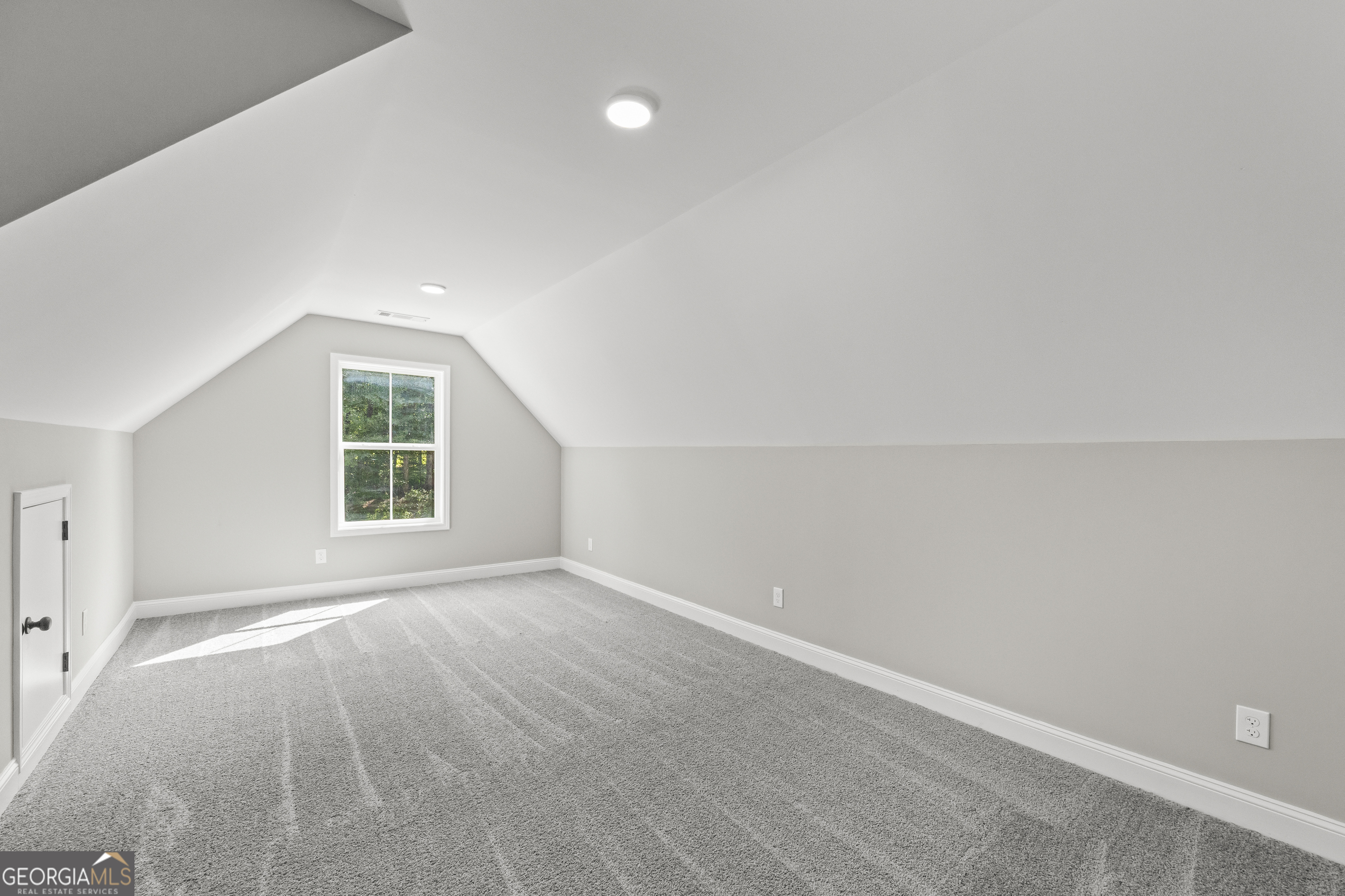 119 Gordon Road Commerce, GA 30530 - Photo 28 of 40 an empty room with windows