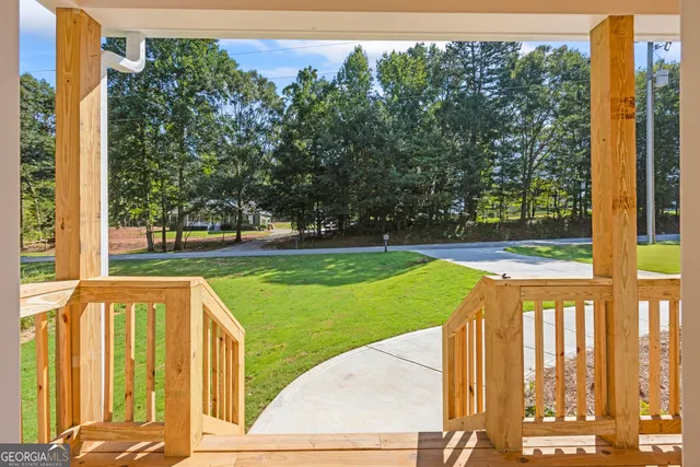 a view of swimming pool from a balcony