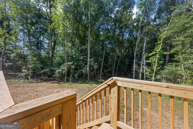 a view of balcony and yard