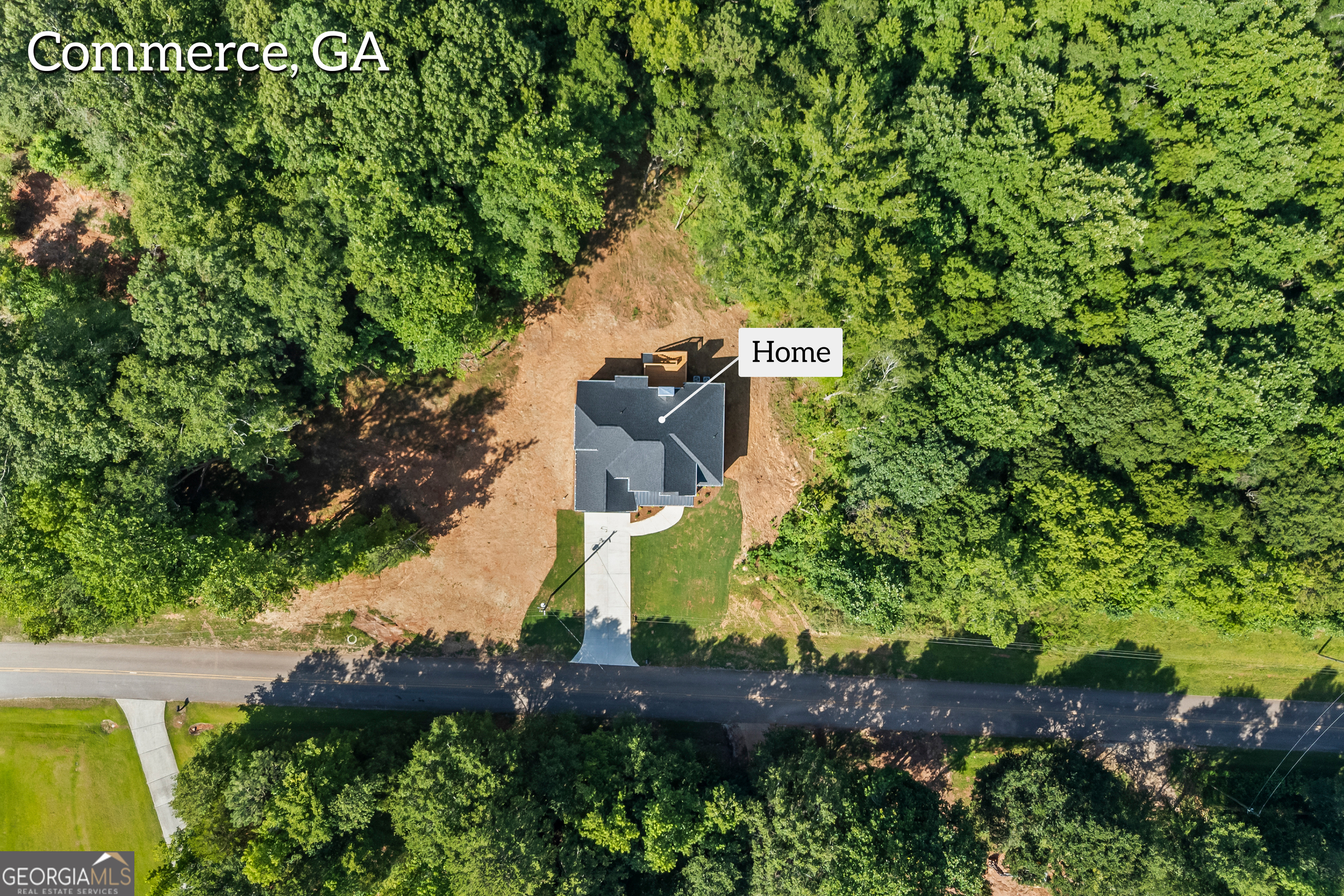119 Gordon Road Commerce, GA 30530 - Photo 34 of 40 an aerial view of a house with a yard