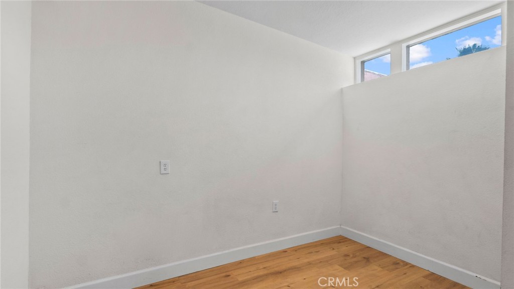 8035 Santa Rita Street Corona, CA 92881 - Photo 14 of 37 a view of small space with empty racks