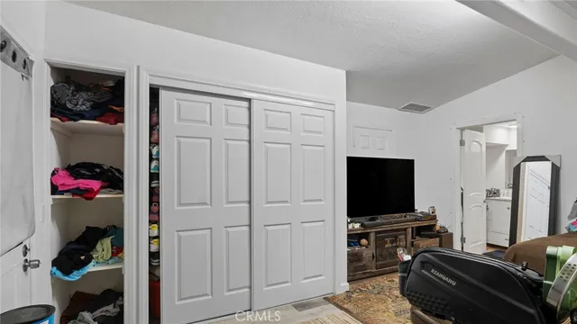 a bed room with a bed and a couch