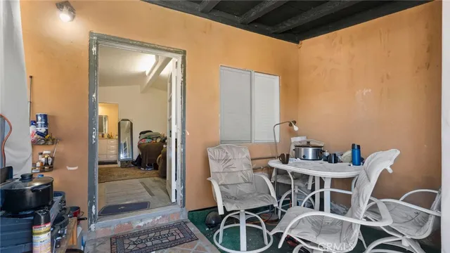 a room with furniture and a window