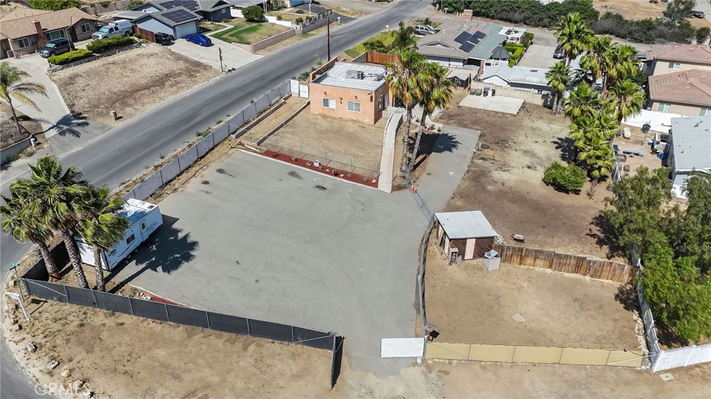 8035 Santa Rita Street Corona, CA 92881 - Photo 35 of 37 an aerial view of a house with a yard and pool