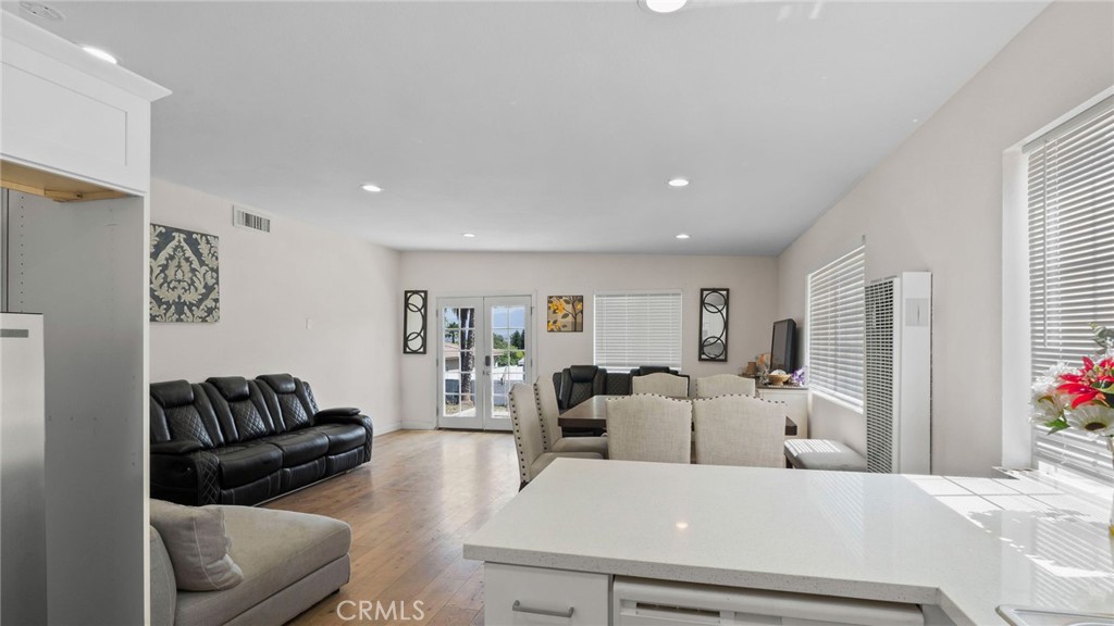 8035 Santa Rita Street Corona, CA 92881 - Photo 4 of 37 a living room with furniture and a couch