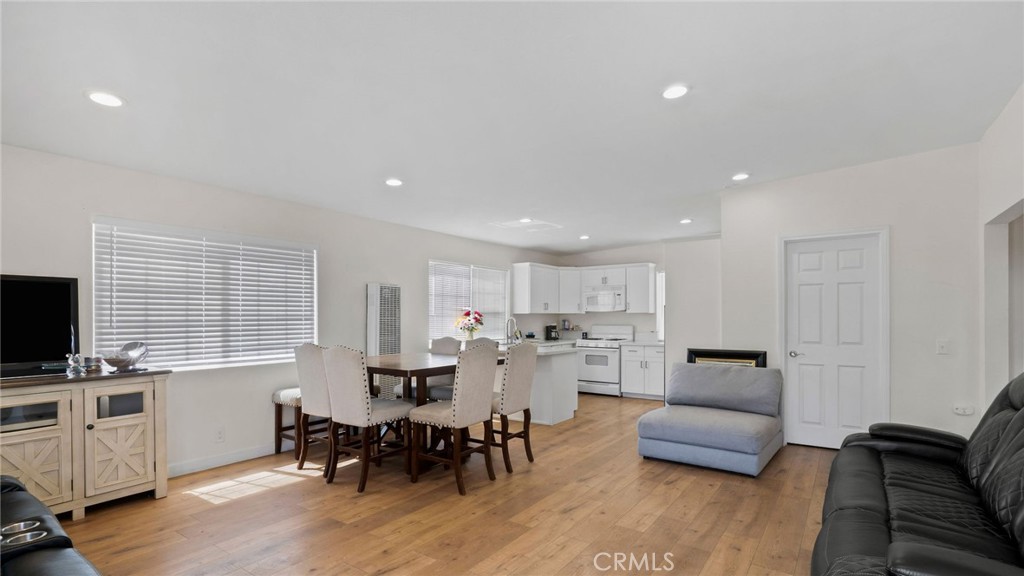8035 Santa Rita Street Corona, CA 92881 - Photo 7 of 37 a living room with furniture and a flat screen tv
