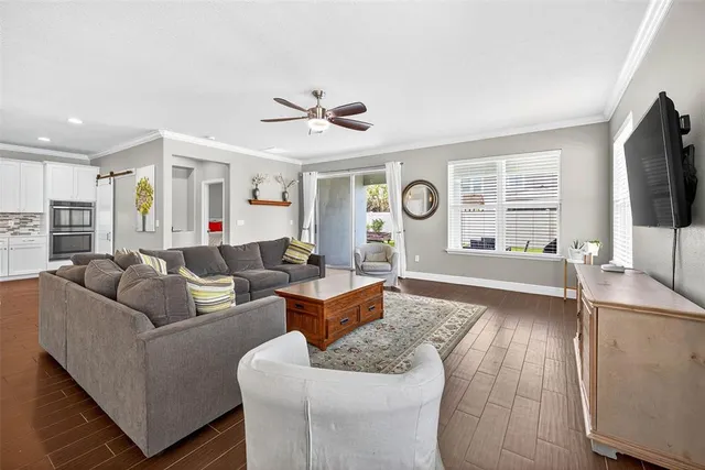 a view of a bedroom with cabinet and closet