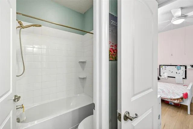 a bathroom with a sink vanity and a mirror