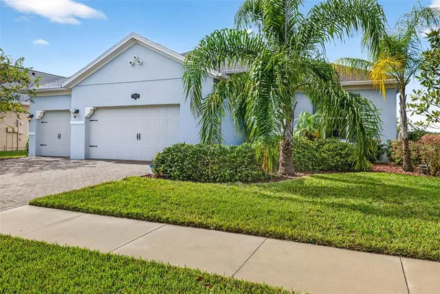 a view of a backyard with green space