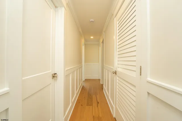 a view of a bathroom from the hallway