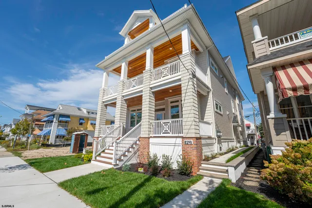 a view of a building with a yard