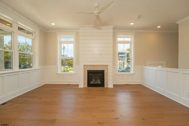 a view of a windows and a fireplace in a room