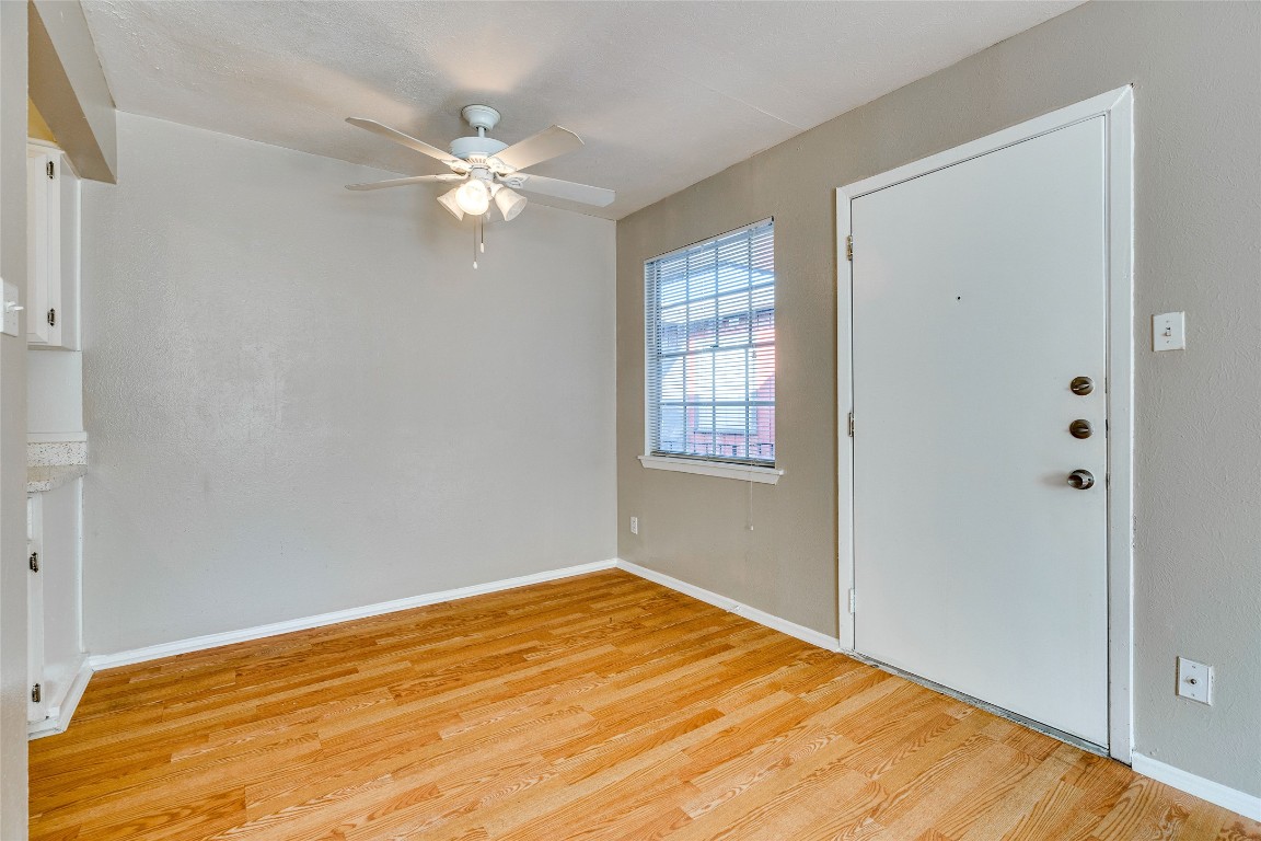 307 East 31st Street, Unit 205 Austin, TX 78705 - Photo 1 of 35 a view of empty room with wooden floor and fan