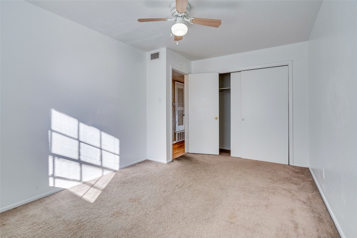 307 East 31st Street, Unit 205 Austin, TX 78705 - Photo 21 of 35 an empty room with windows and closet