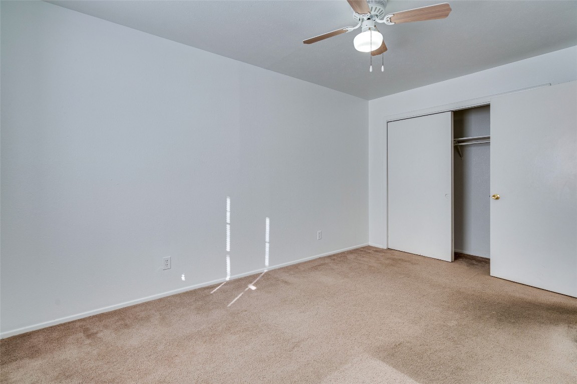 307 East 31st Street, Unit 205 Austin, TX 78705 - Photo 26 of 35 a view of an empty room with a ceiling fan