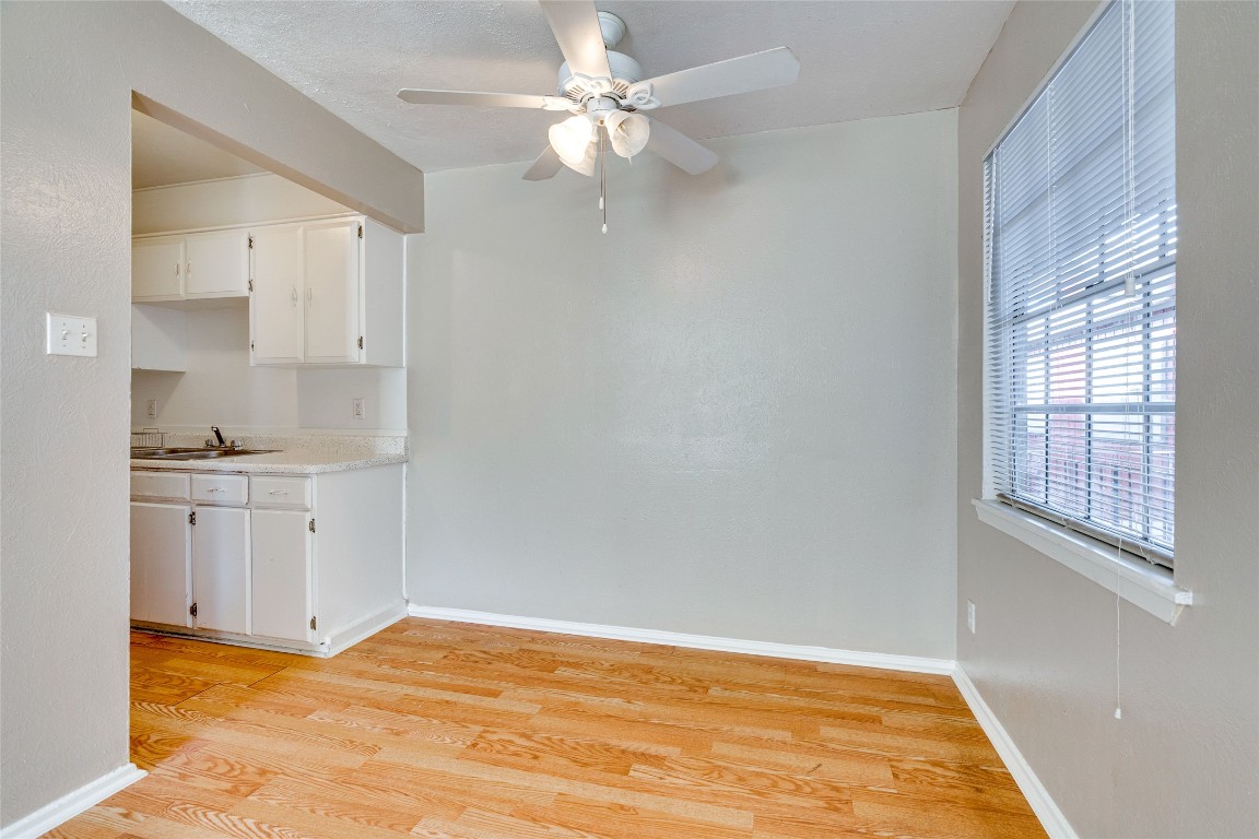 307 East 31st Street, Unit 205 Austin, TX 78705 - Photo 4 of 35 a view of a kitchen with marble kitchen and kitchen sink