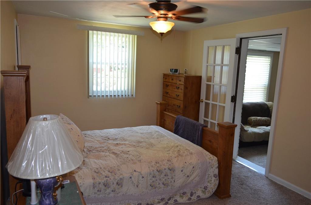 474 Haverhill Road Mt. Lebanon, PA 15228 - Photo 6 of 20 Master Bedroom, udated wall to wall carpeting, and ceiling fan, french door to master sitting room