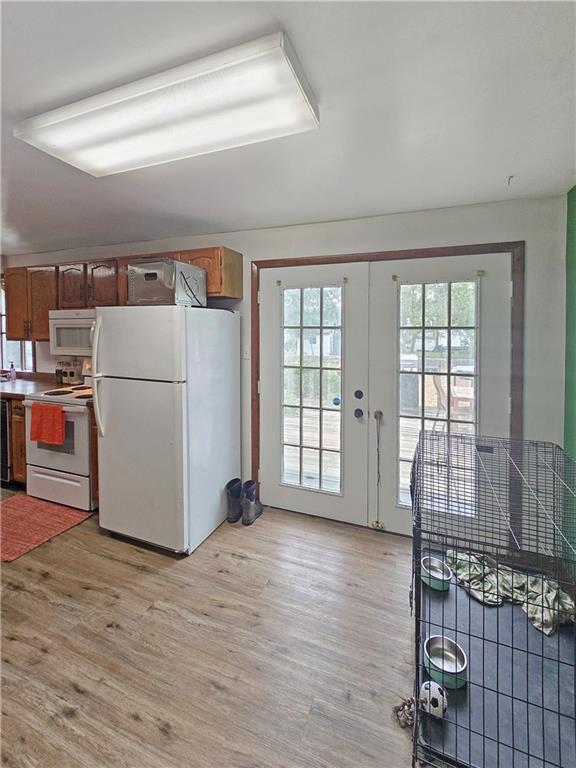 3413 4th Street Dunbar, PA 15431 - Photo 5 of 13 a view of a kitchen with wooden floor and electronic appliances