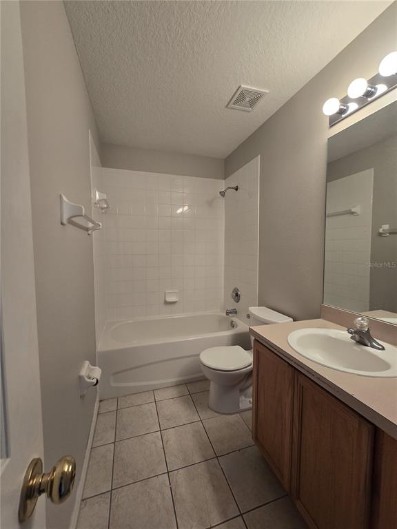 236 Castlekeeper Place Valrico, FL 33594 - Photo 9 of 14 a bathroom with a sink a toilet and shower