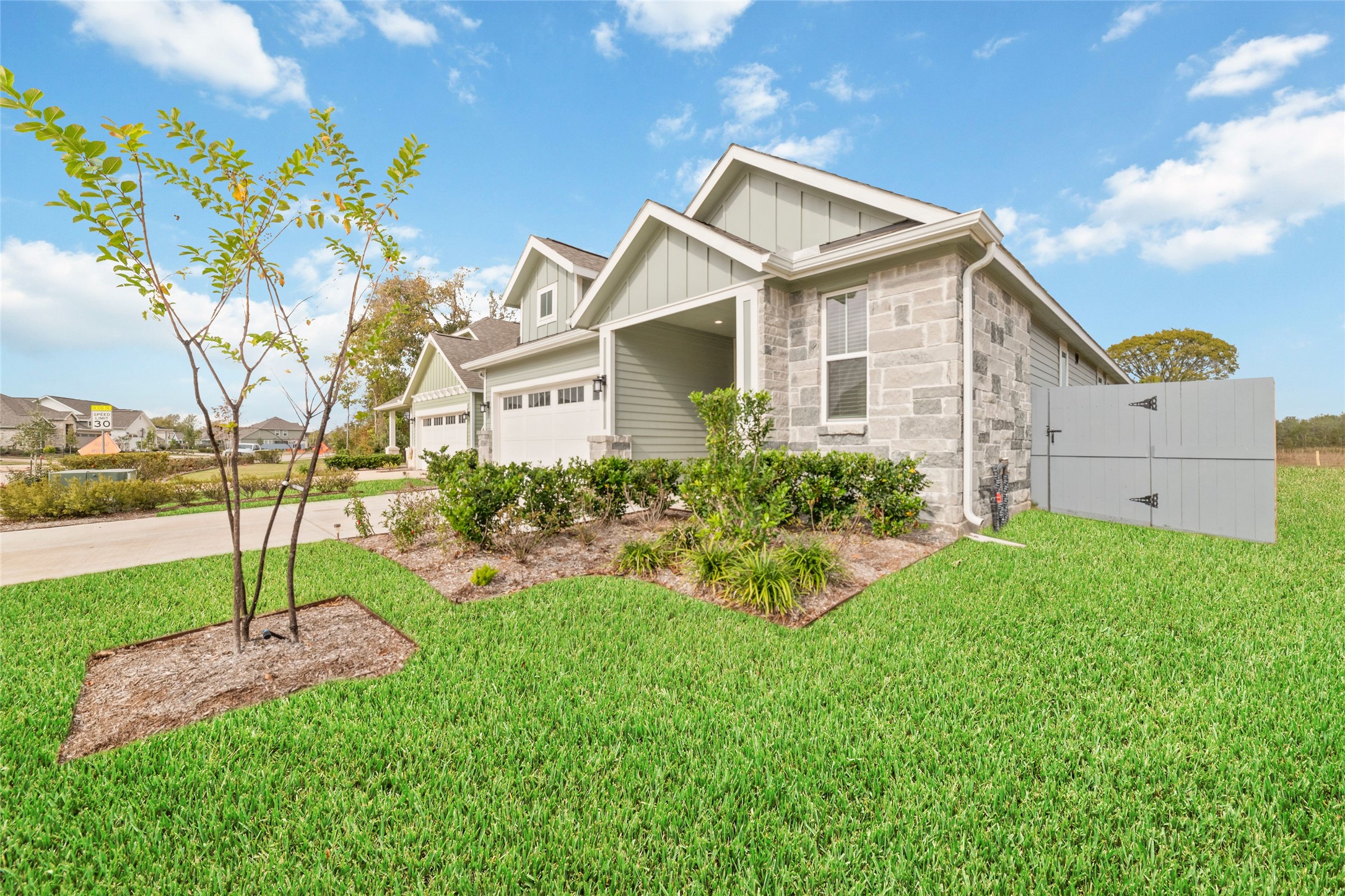 32906 School Hl Road Fulshear, TX 77441 - Photo 2 of 25 a front view of house with a garden