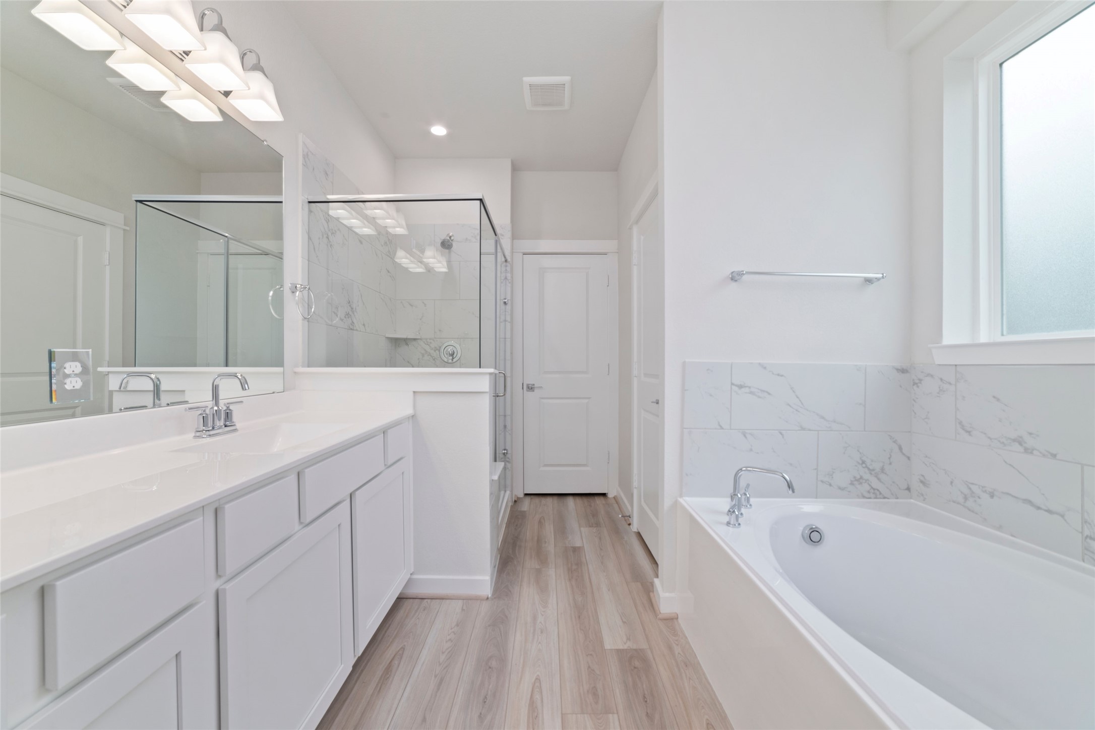 32906 School Hl Road Fulshear, TX 77441 - Photo 21 of 25 a bathroom with a tub a sink and mirror