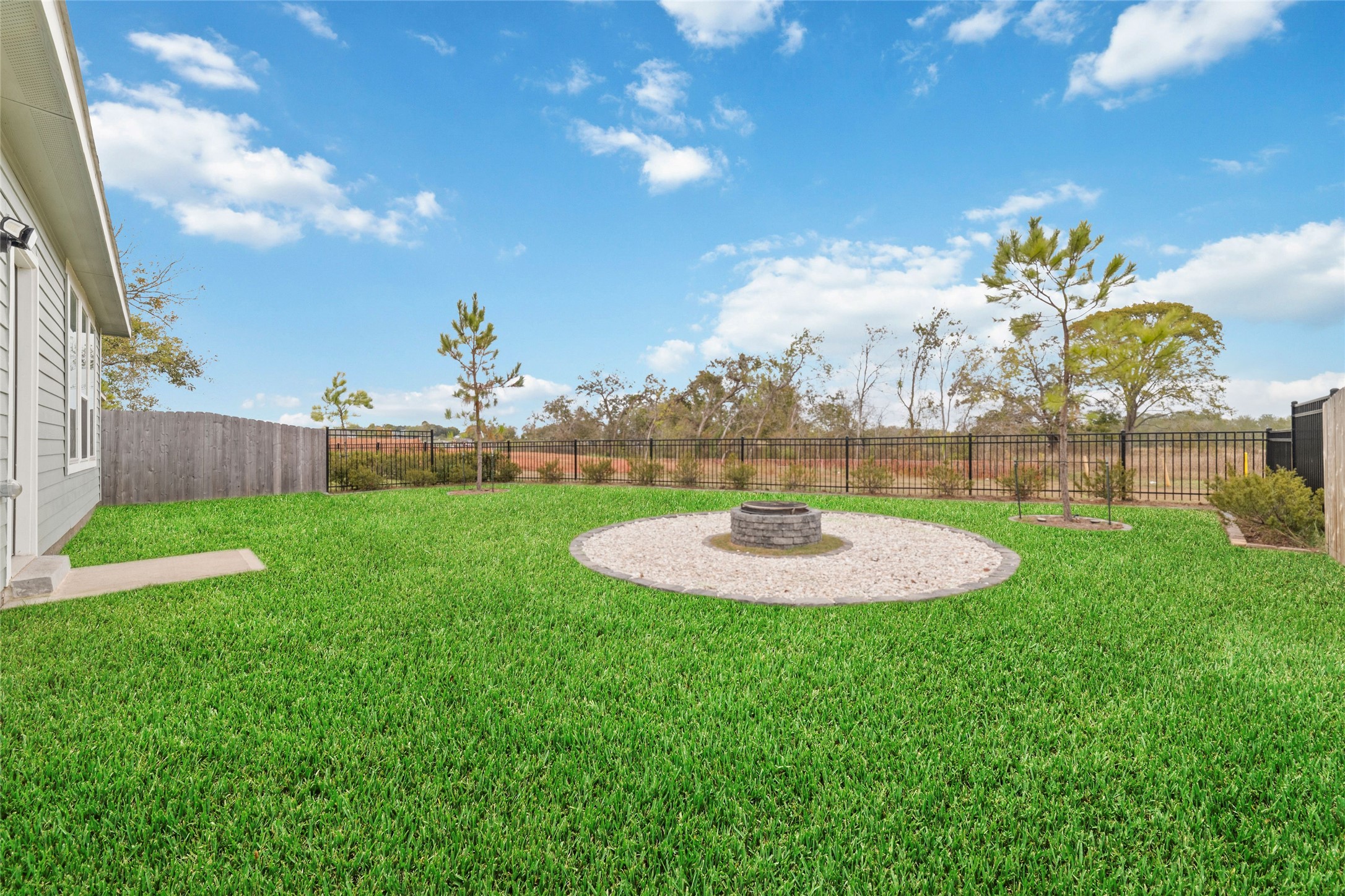 32906 School Hl Road Fulshear, TX 77441 - Photo 24 of 25 a view of a golf course with a garden