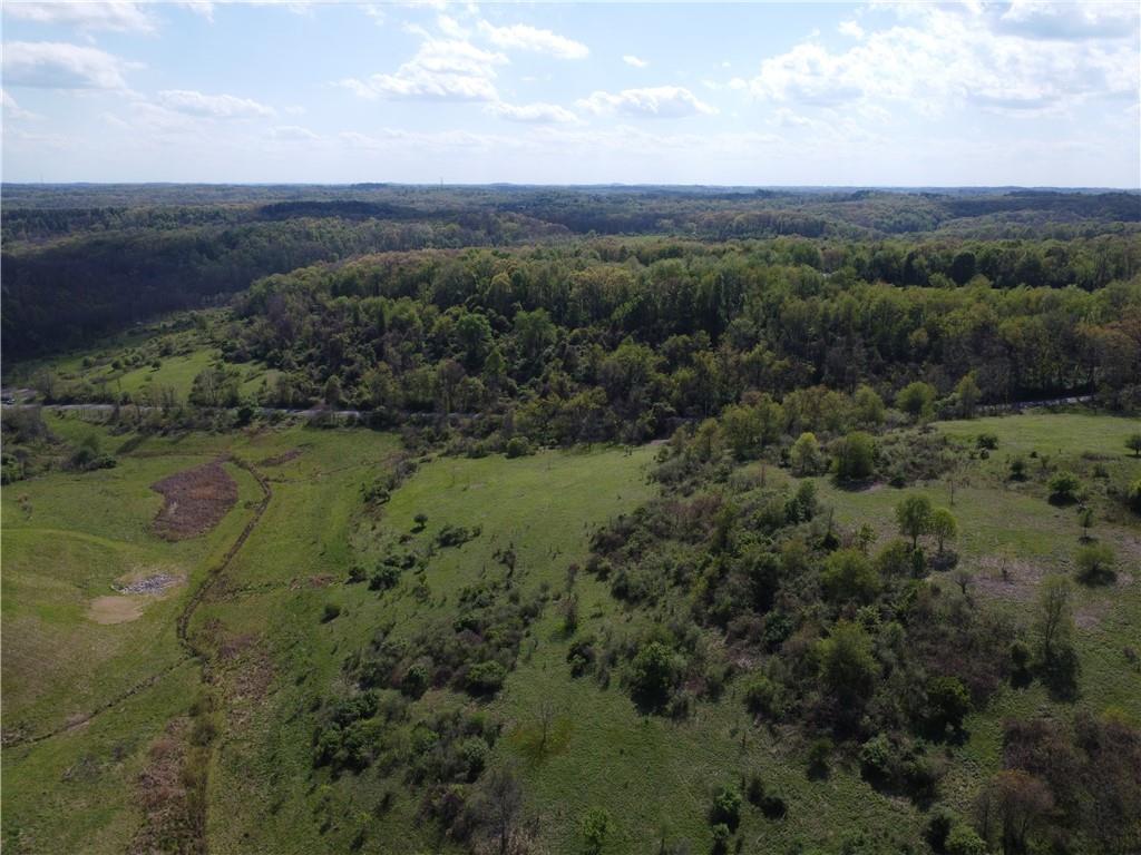 5692 North Montour Road Gibsonia, PA 15044 - Photo 3 of 6 a view of a lush green forest with lots of trees
