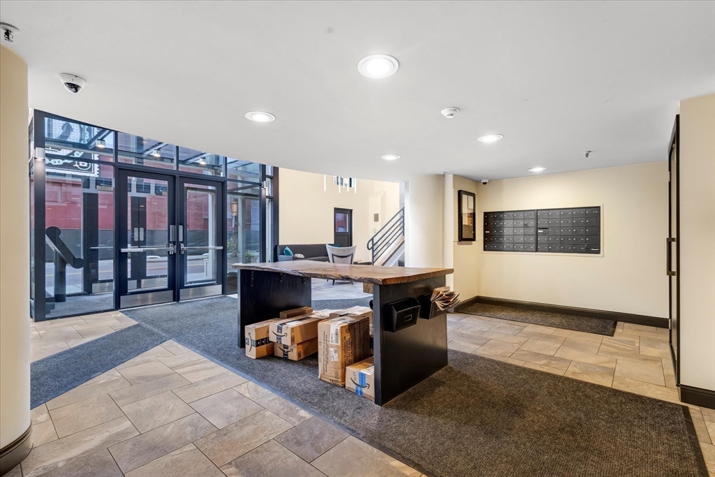 106 13th Street, Unit 114 Boston, MA 02129 - Photo 26 of 42 a view of living room with furniture and a floor to ceiling window