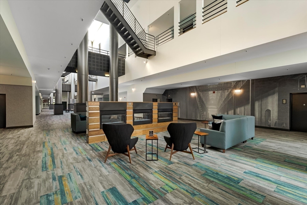 106 13th Street, Unit 114 Boston, MA 02129 - Photo 35 of 42 a dining room with furniture and wooden floor