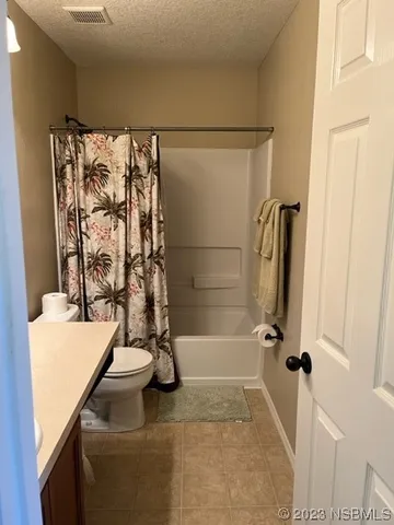 a bathroom with a sink and a shower