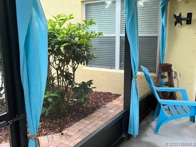 a view of balcony with wooden floor