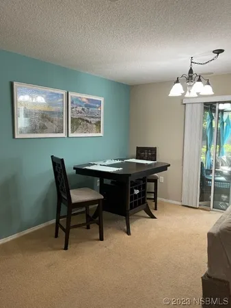 a view of a workspace with furniture