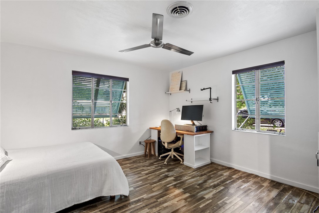 1908 37th Avenue Vero Beach, FL 32960 - Photo 22 of 34 a bedroom with a bed and a window