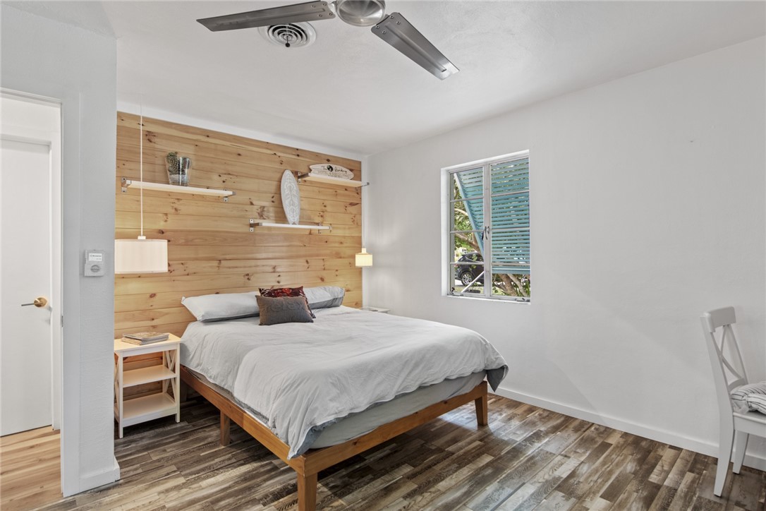 1908 37th Avenue Vero Beach, FL 32960 - Photo 23 of 34 a bedroom with a bed and a window