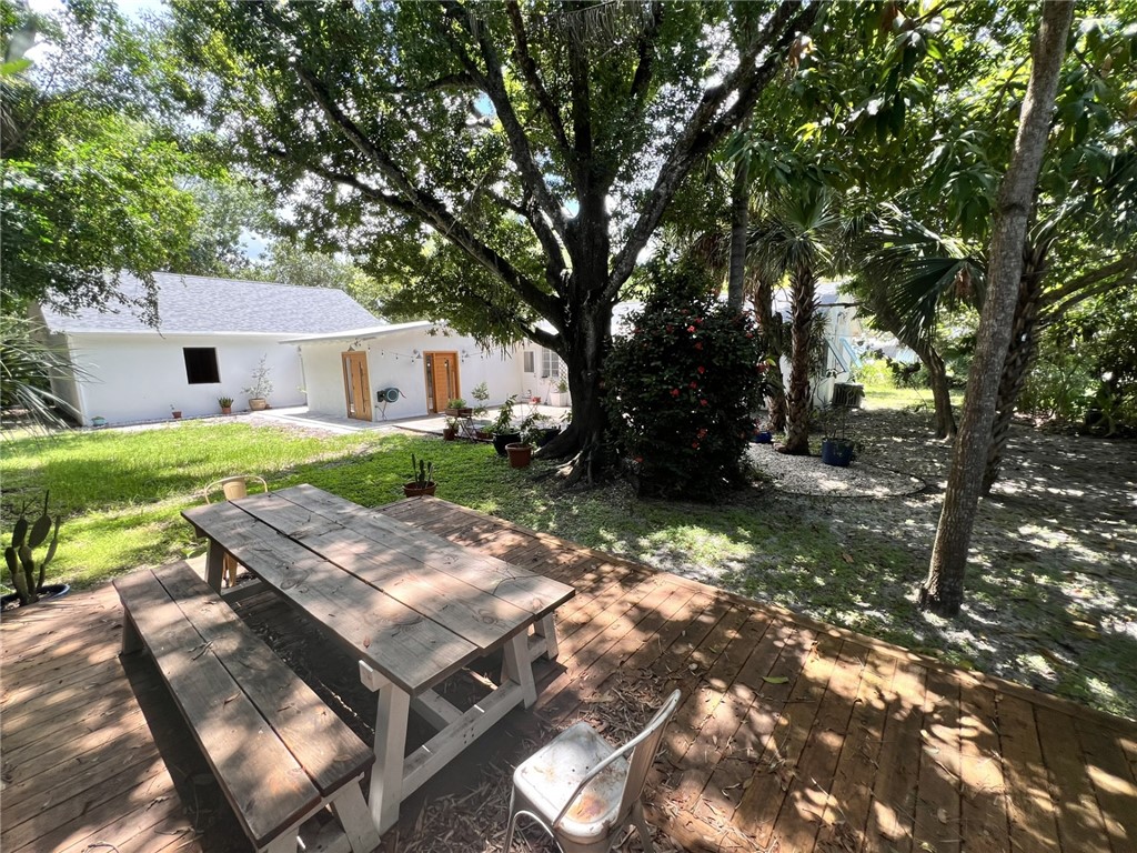 1908 37th Avenue Vero Beach, FL 32960 - Photo 32 of 34 a view of a house with backyard and sitting area