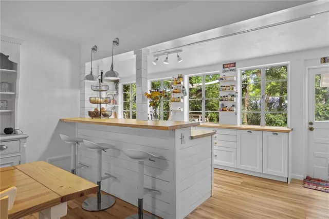 a living room with furniture and window