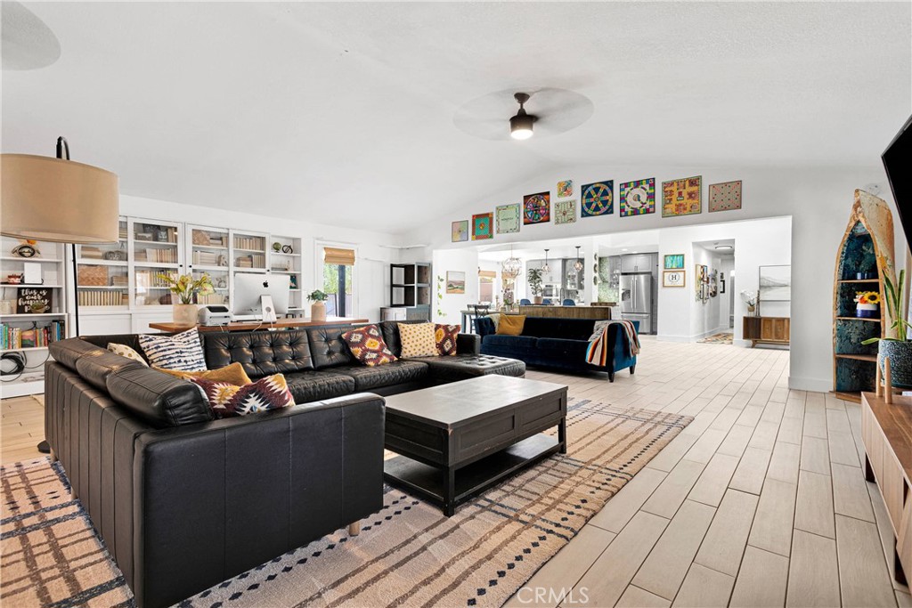 37077 Coyote Lake Road Newberry Springs, CA 92365 - Photo 16 of 58 a living room with furniture and a couch