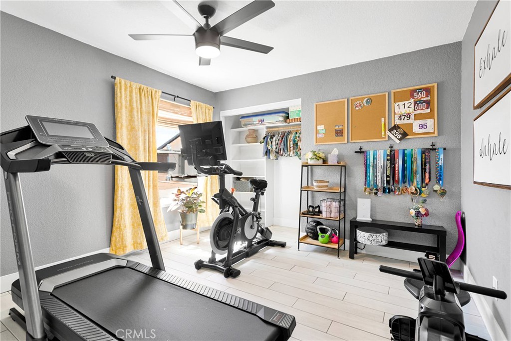 37077 Coyote Lake Road Newberry Springs, CA 92365 - Photo 22 of 58 a view of a room with gym equipment