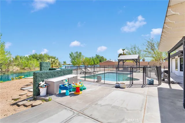 walk in closet with wooden floor