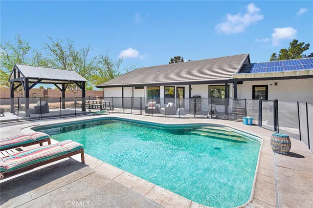 a view with a table and a chair