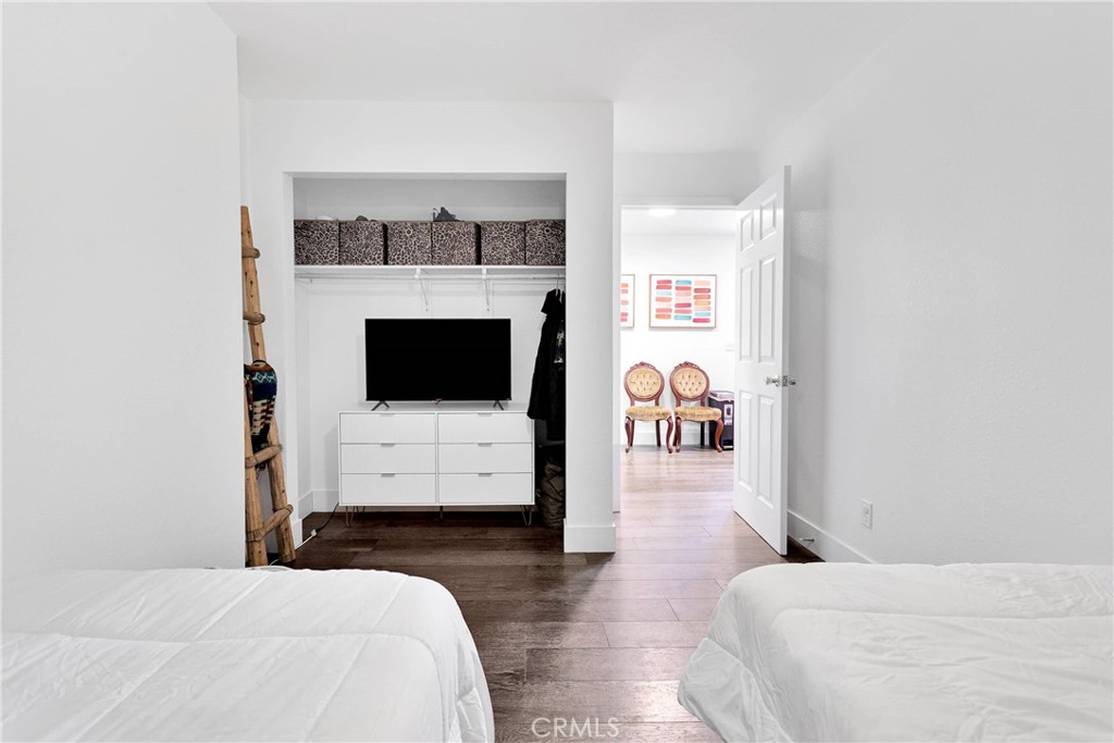 37077 Coyote Lake Road Newberry Springs, CA 92365 - Photo 53 of 58 a bedroom with a bed and a couch