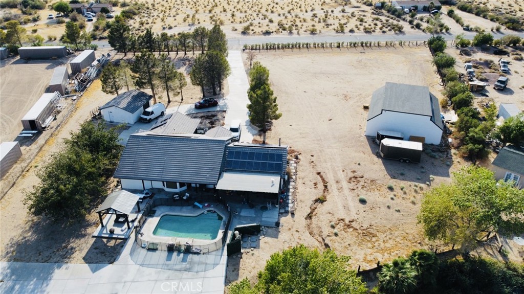 37077 Coyote Lake Road Newberry Springs, CA 92365 - Photo 56 of 58 an aerial view of a house with table and chairs