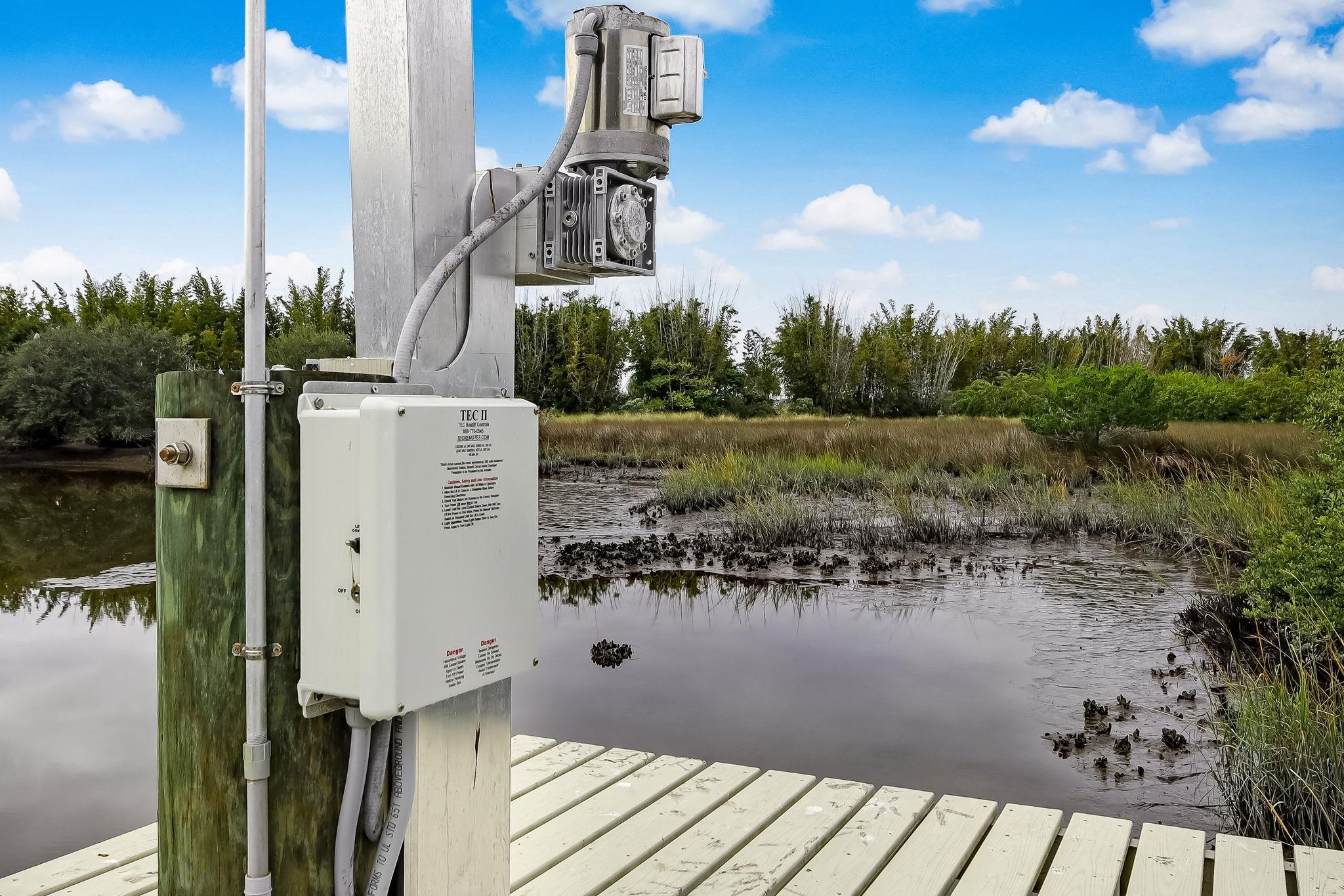644 Sun Down Circle St. Augustine, FL 32080 - Photo 50 of 69 a view of a lake with a house in the background
